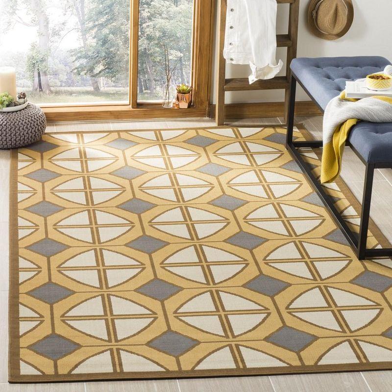 Ivory and Camel Geometric Outdoor Area Rug