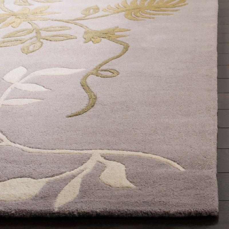 Soho SOH313 Hand Tufted Area Rug  - Safavieh