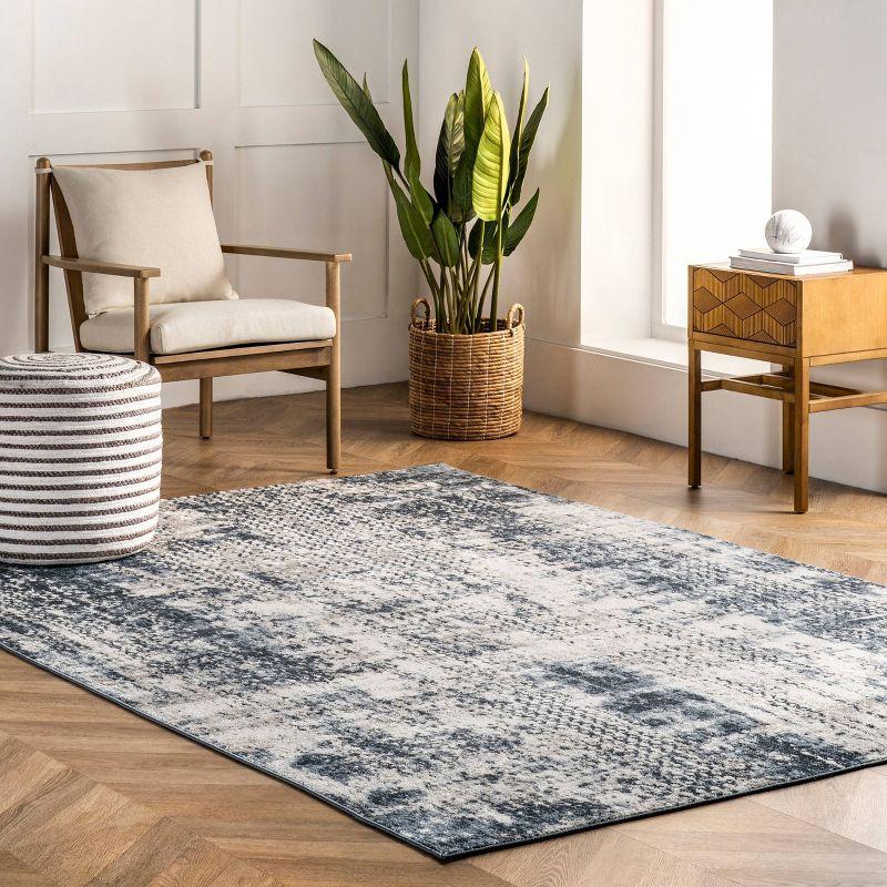 Reversible Abstract Blue Synthetic 4' x 6' Easy-Care Area Rug