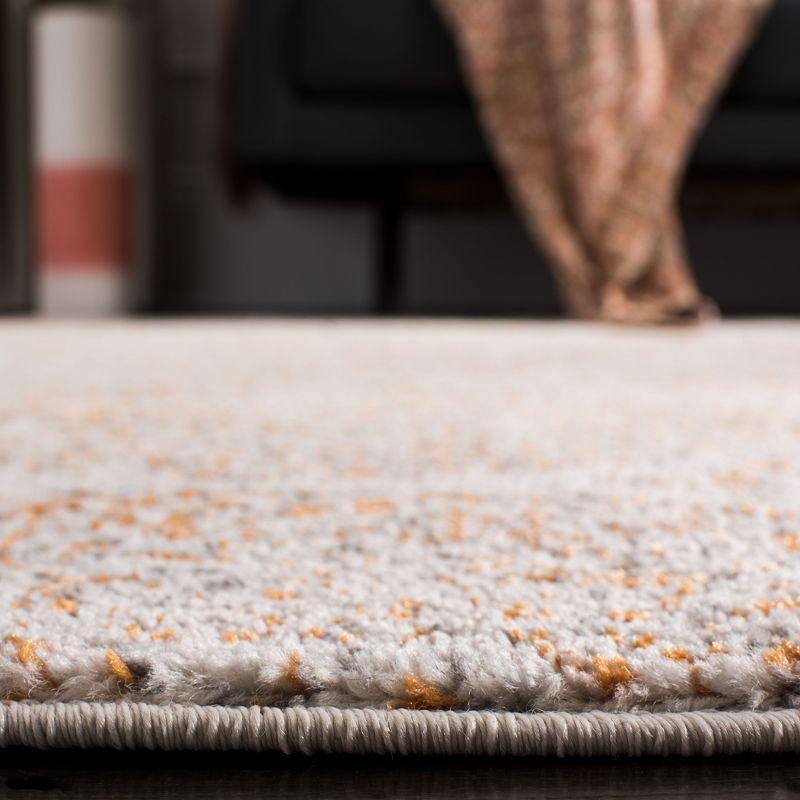 Cream/Orange Easy-Care Synthetic 9' x 12' Area Rug