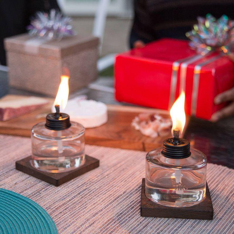 TIKI Mixed Material Tabletop Torch: Weather-Resistant, Smooth Finish, Refillable Fuel Canister, No Assembly Required