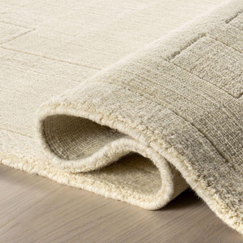 Latitude Run® Rune Bordered Wool-Blend Area Rug