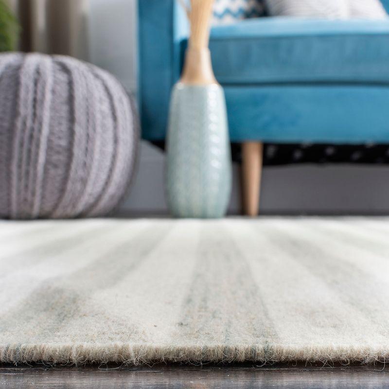 Dhurries DHU575 Hand Woven Flat Weave Area Rug Light Blue / Ivory 8' X 10' - Safavieh.