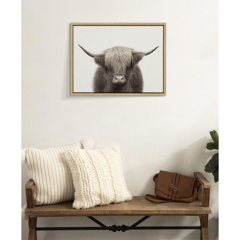 Kate and Laurel Sylvie Hey Dude Highland Cow Color Framed Canvas by The Creative Bunch Studio, 18x24, Natural