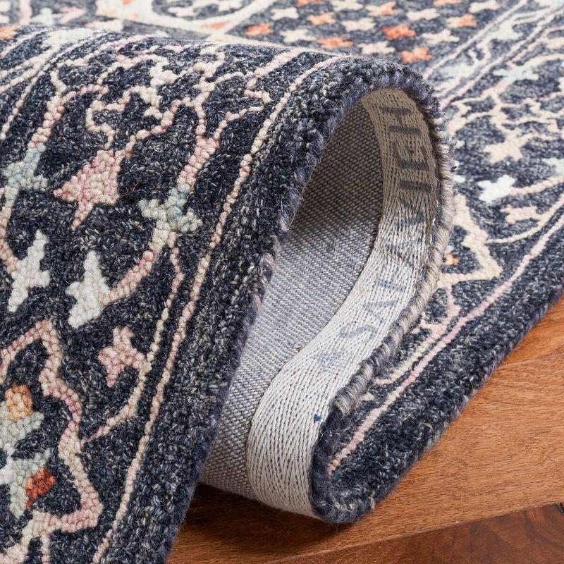 Aspen APN130 Hand Tufted Area Rug  - Black/Rust - 5'x5' - Safavieh.