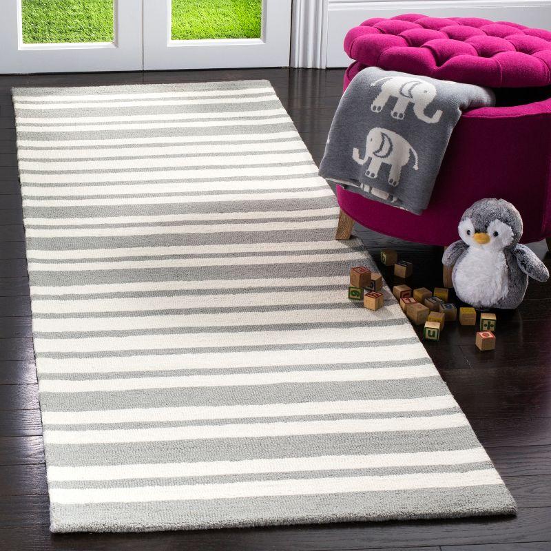 Safavieh Kids SFK917 Hand Tufted Area Rug  - Safavieh