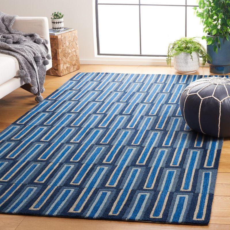 Ivory and Blue Geometric Wool 6' x 9' Handmade Tufted Rug