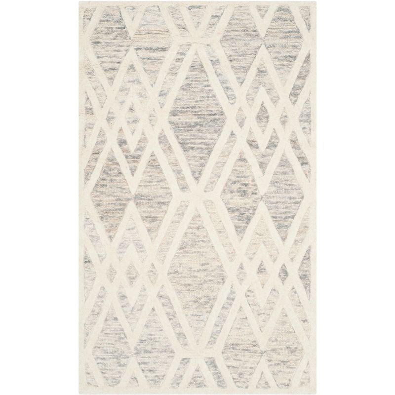 Cambridge CAM729 Hand Tufted Area Rug  - Safavieh