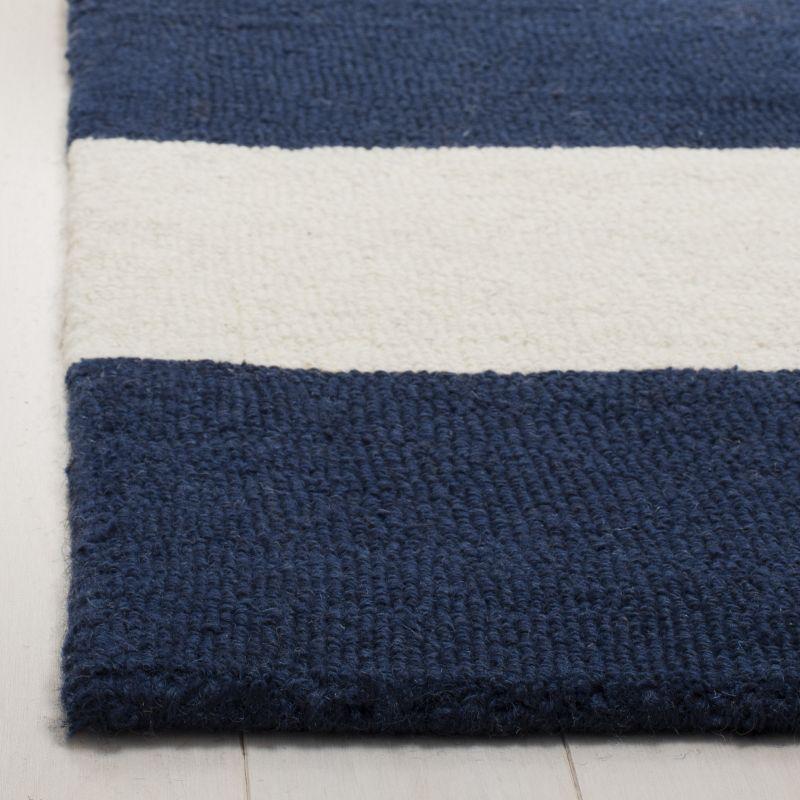 Safavieh Kids Stripe SFK919 Hand Tufted Indoor Area Rug - Navy/Ivory - 9'x12' - Safavieh