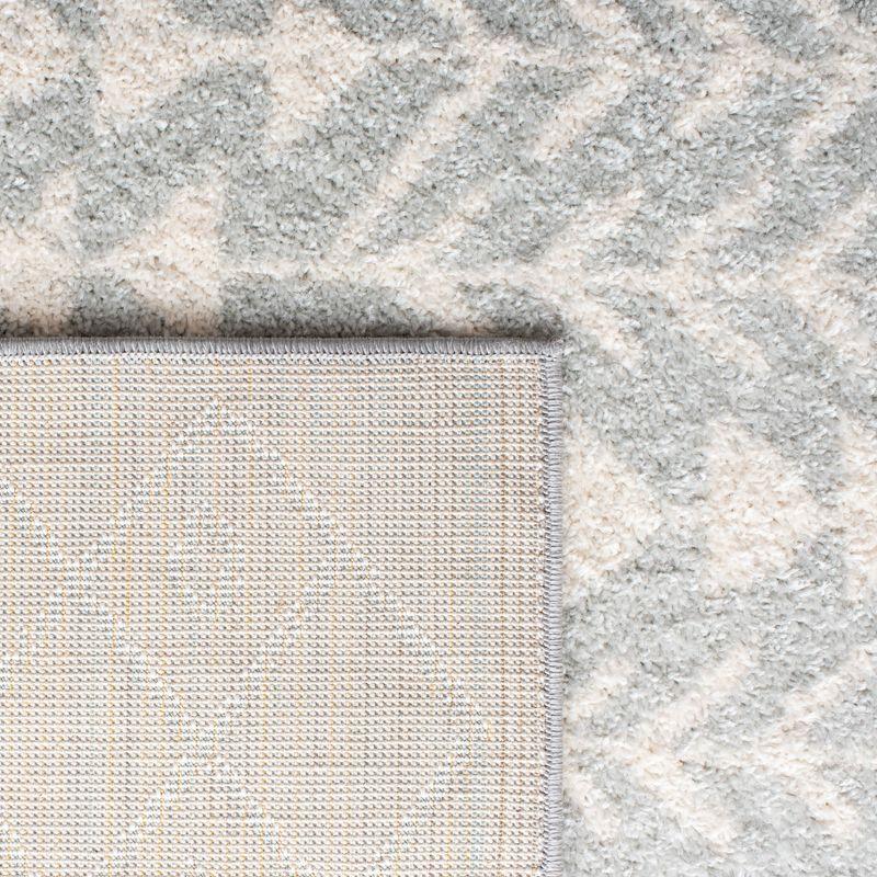 Reversible Light Grey/Ivory Synthetic 6' x 9' Area Rug