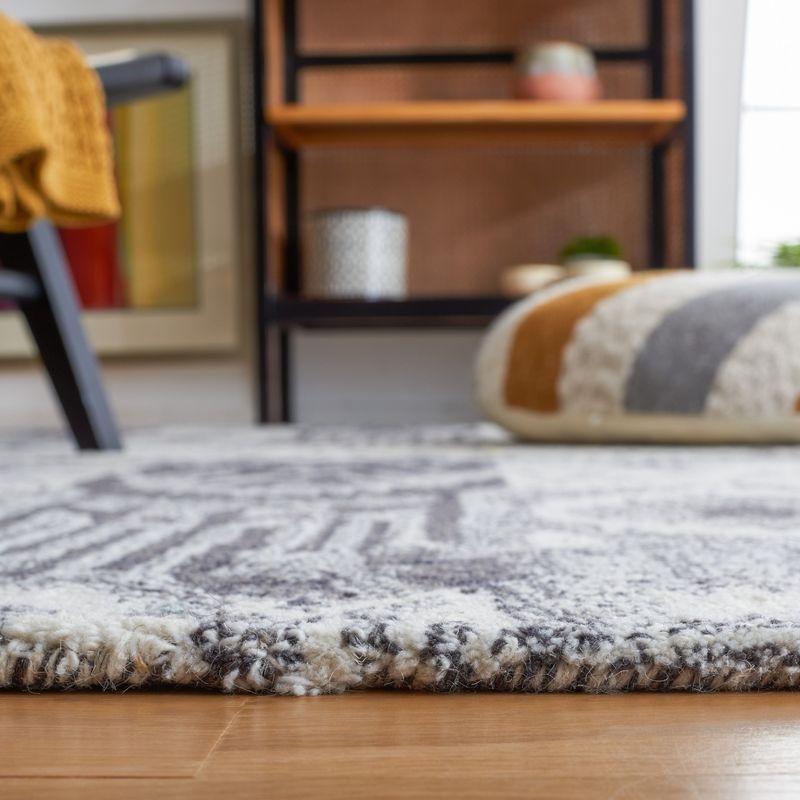Ikat IKT653 Hand Tufted Area Rug - Ivory/Black - 3'x5' - Safavieh.