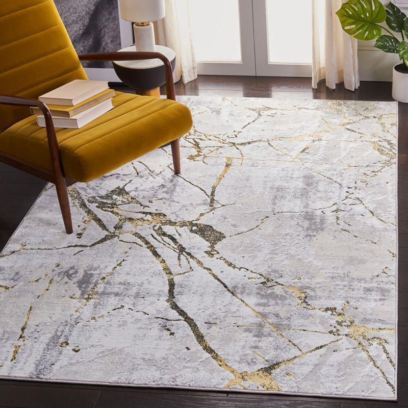 Grey and Gold 8' x 10' Reversible Washable Synthetic Area Rug