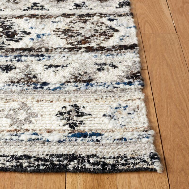 Manhattan Luxe Black and Ivory Hand-Knotted Wool Shag Rug - 4' x 6'