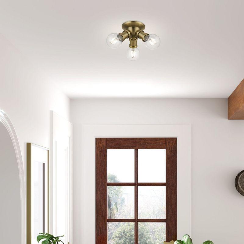 Livex Lighting Lansdale 3 - Light Flush Mount in  Antique Brass