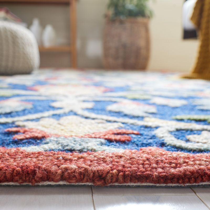 Blossom BLM562 Hand Tufted Area Rug - Blue/Rust - 6'x6' - Safavieh.