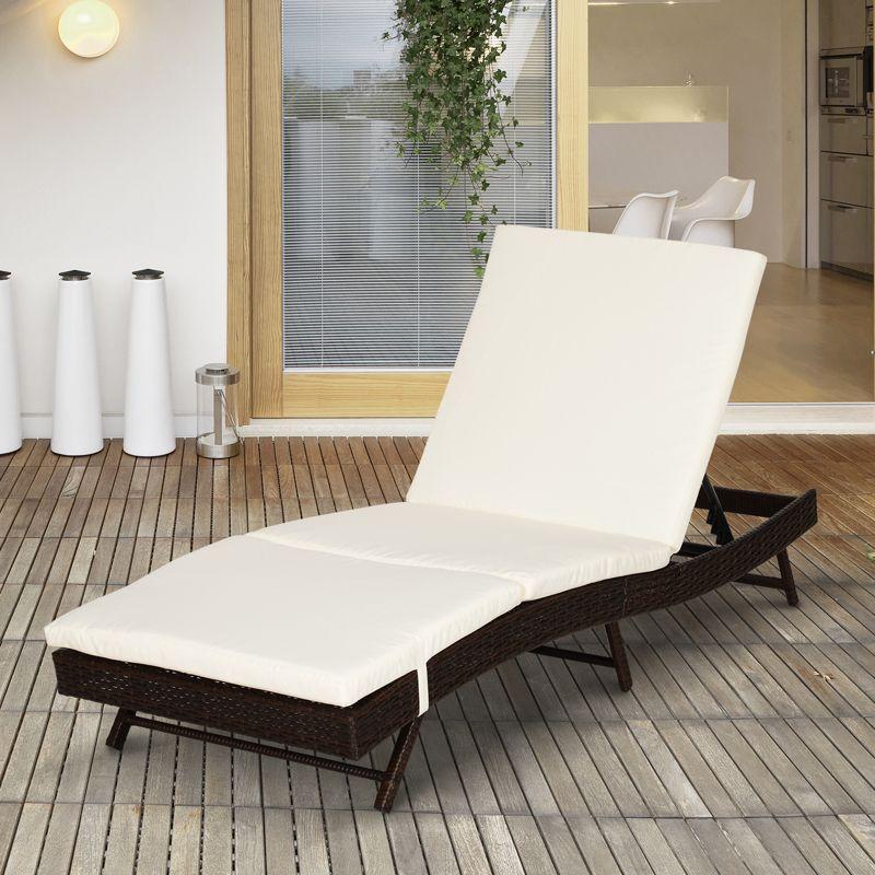 Adjustable Brown Rattan Chaise Lounge with Cream Cushions