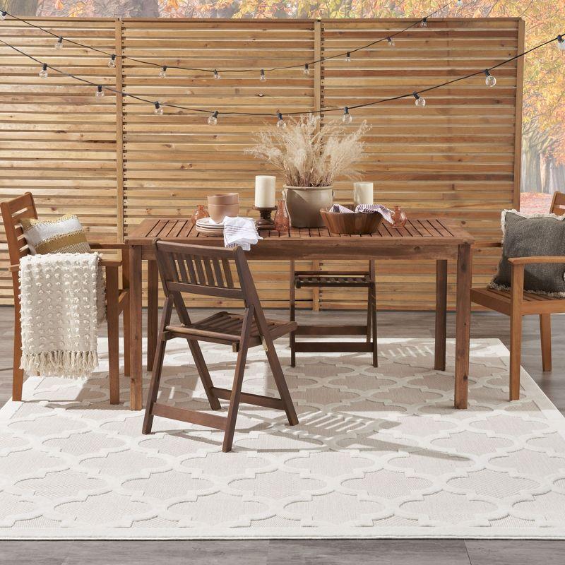 Nourison Easy Care 9' x 12' Ivory/White Indoor/Outdoor Rug