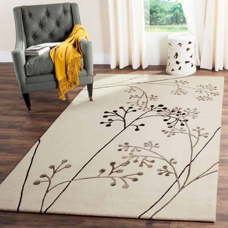 Soho SOH305 Hand Tufted Area Rug  - Safavieh