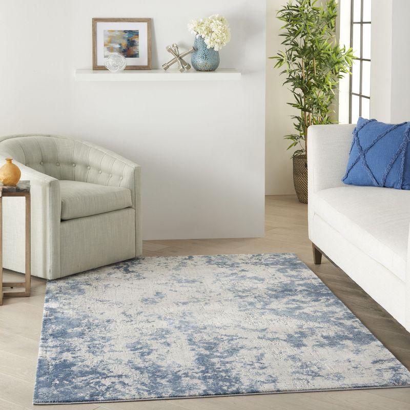 Gray and Blue Abstract 4' x 6' Synthetic Area Rug