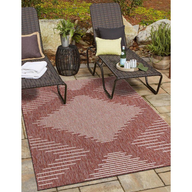 Rust Red and Ivory Rectangular Outdoor Synthetic Area Rug 4' x 6'