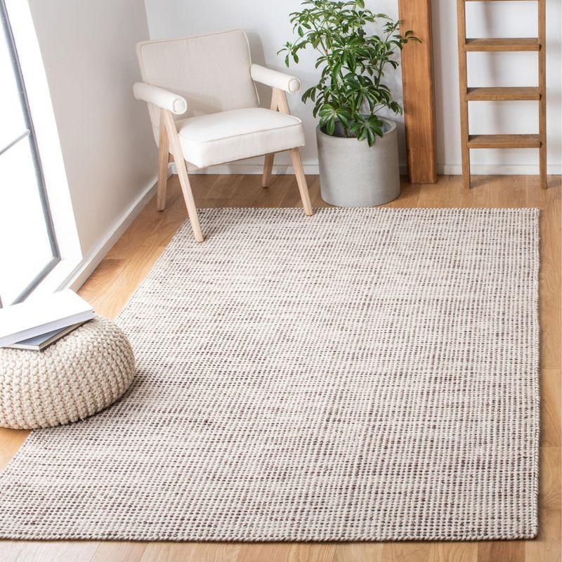 Ivory and Brown Handmade Tufted Wool Rectangular Rug