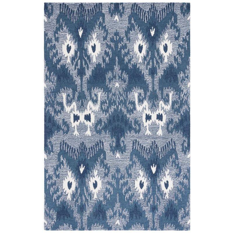 Ikat IKT652 Hand Tufted Area Rug - Blue/Ivory - 8'x10' - Safavieh.