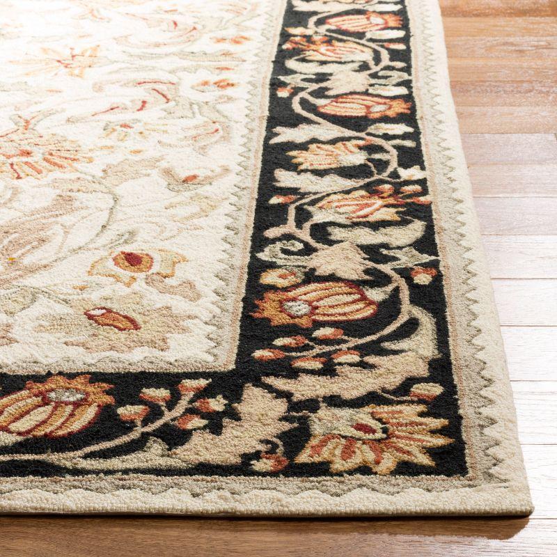 Ivory and Black Hand-Hooked Synthetic Runner Rug