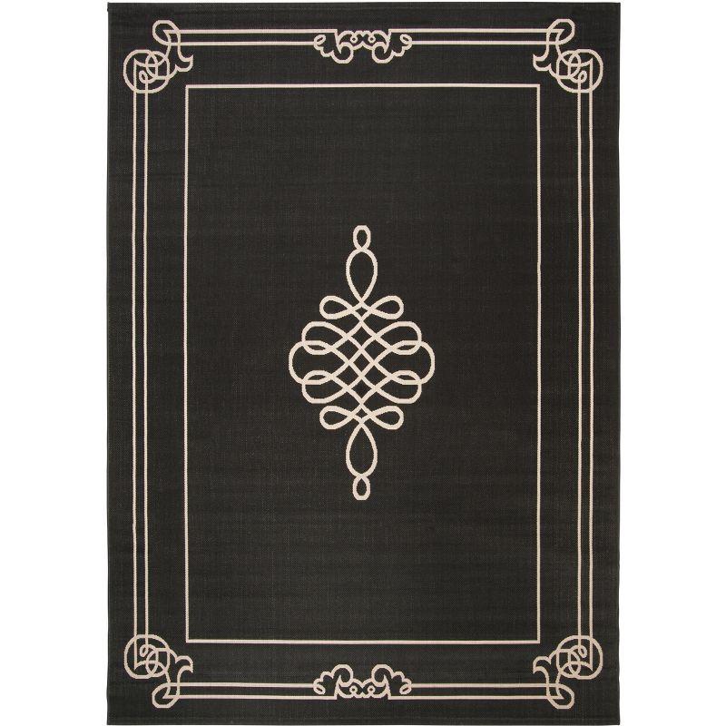 Black and Creme Rectangular 8' x 10' Synthetic Area Rug