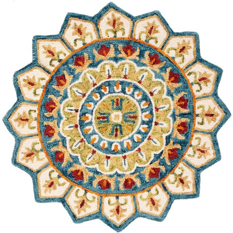 Novelty NOV605 Hand Tufted Area Rug - Ivory/Blue - 9' round - Safavieh.