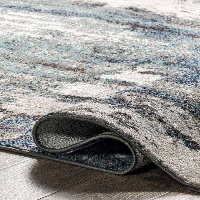 Blue Abstract Synthetic Easy Care Area Rug 6' 7" x 9'