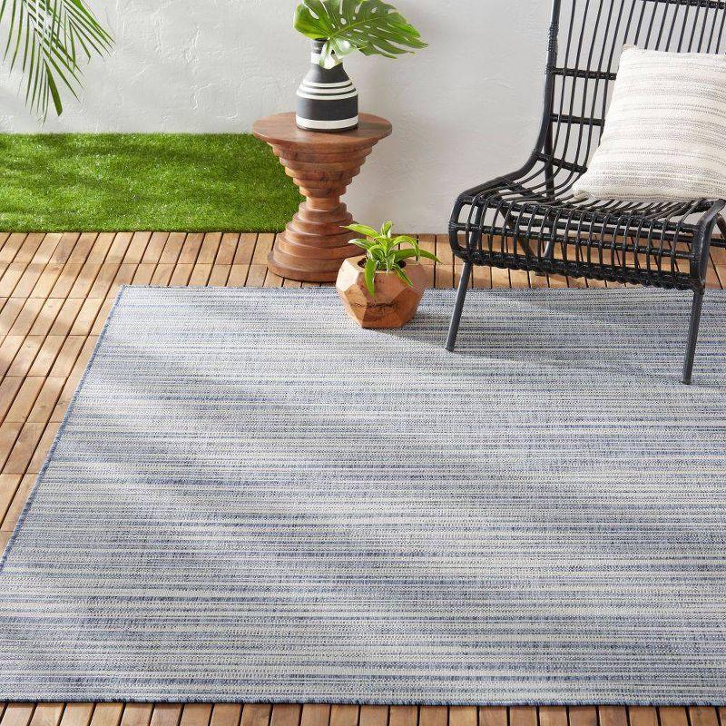 Nicole Miller Abstract Blue Indoor / Outdoor Area Rug