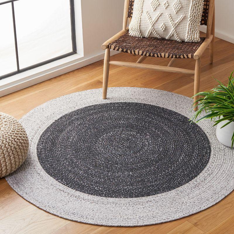 Handmade Black and Light Grey Round Braided Rug, 4 ft