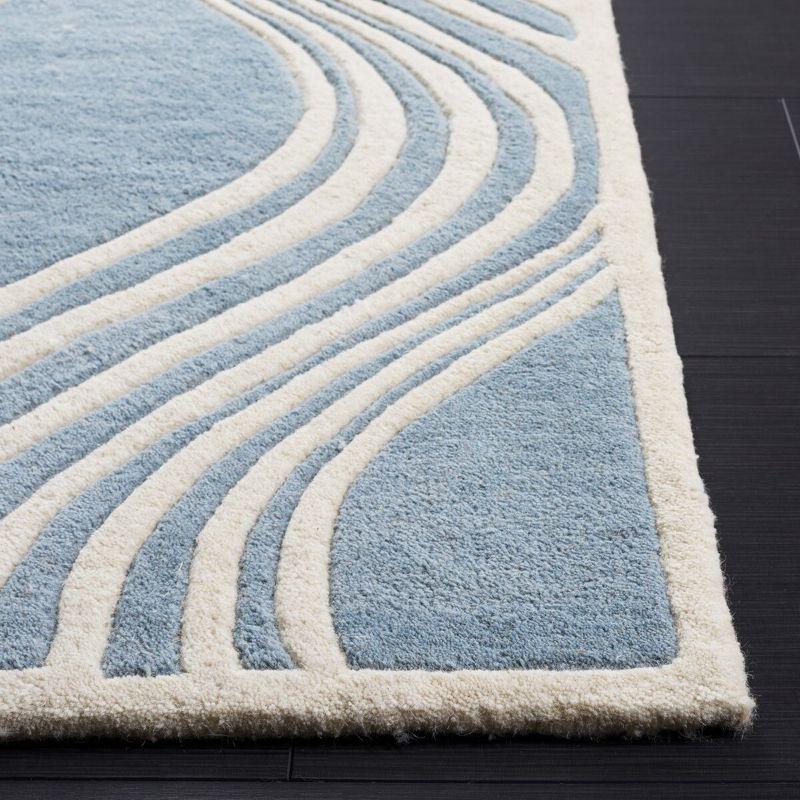 Blue and Ivory Hand-Tufted Wool 4' x 6' Area Rug