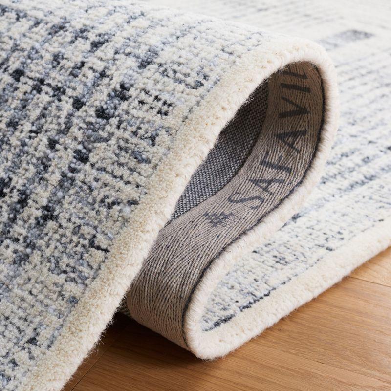 Metro MET991 Hand Tufted Indoor Area Rug - Light Grey/Ivory - 5'x8' - Safavieh