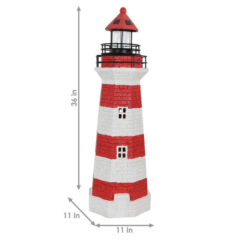 Longshore Tides Caudillo Striped Resin Solar Resin Outdoor LED Lighthouse Statue