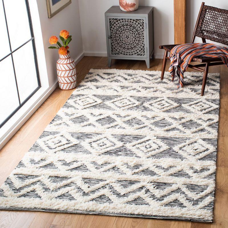 Bohemian Black and Ivory Hand-Knotted Wool Area Rug 6' x 9'