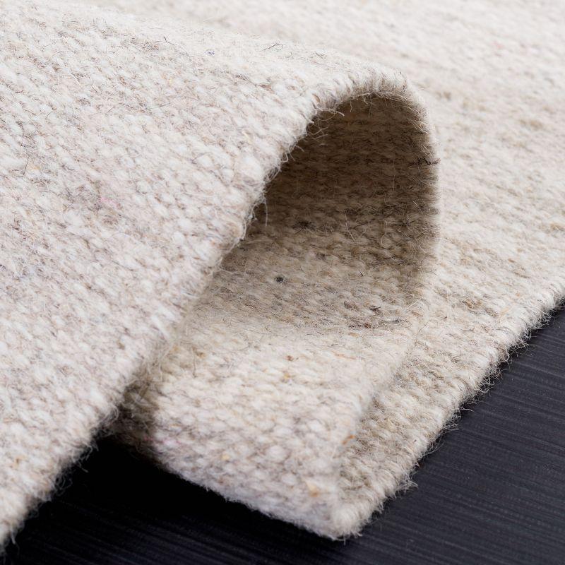 Dhurries DHU801 Hand Loomed Area Rug - Beige - 8'x10' - Safavieh.