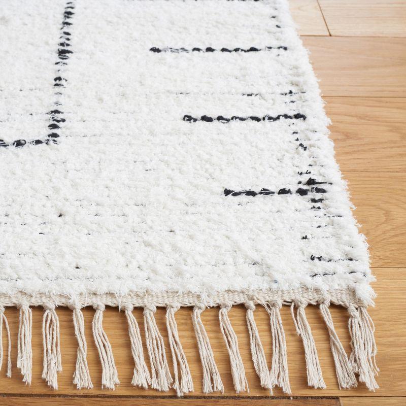 Casablanca 3' x 5' Ivory and Black Wool Shag Area Rug