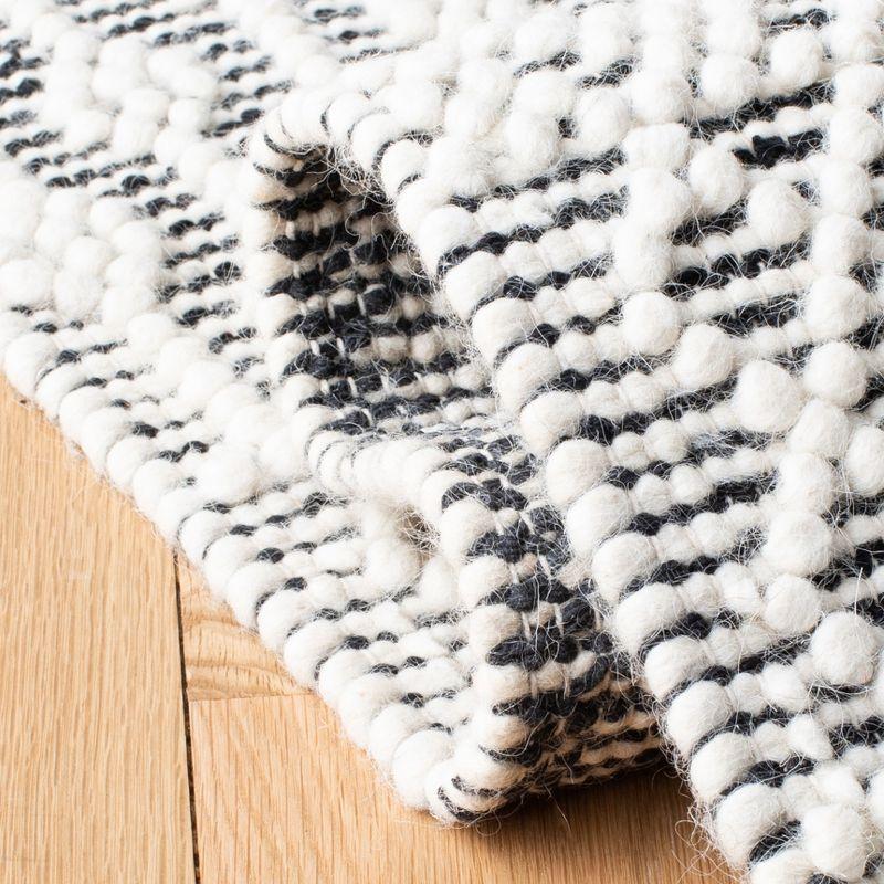 Ivory and Black Handwoven Wool Southwestern Rug