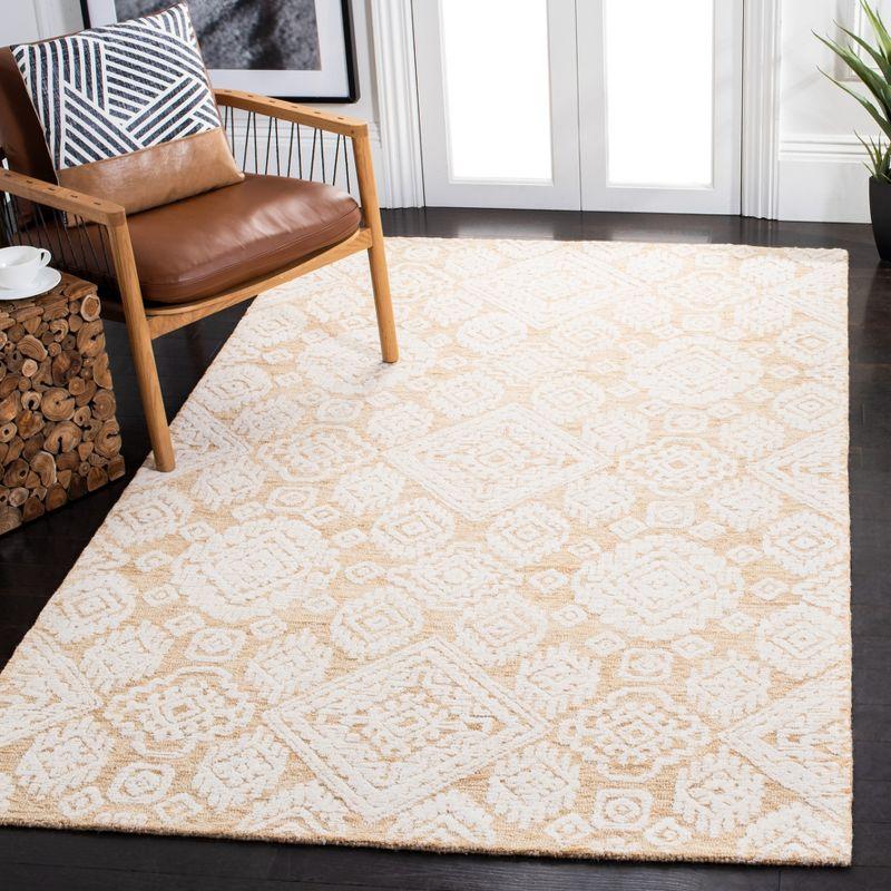 Ivory and Gold Hand-Tufted Wool 6' x 9' Area Rug