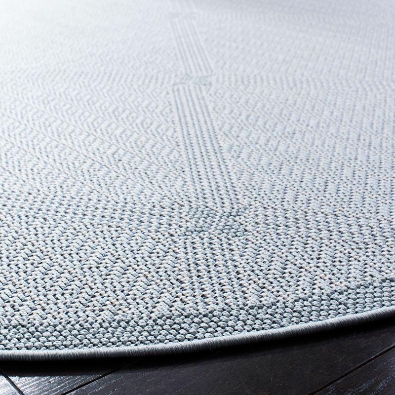 Light Blue Diamond Pattern Round Synthetic Rug