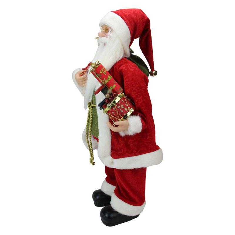 24" Red and White Santa Claus with Presents and Drum Christmas Figure