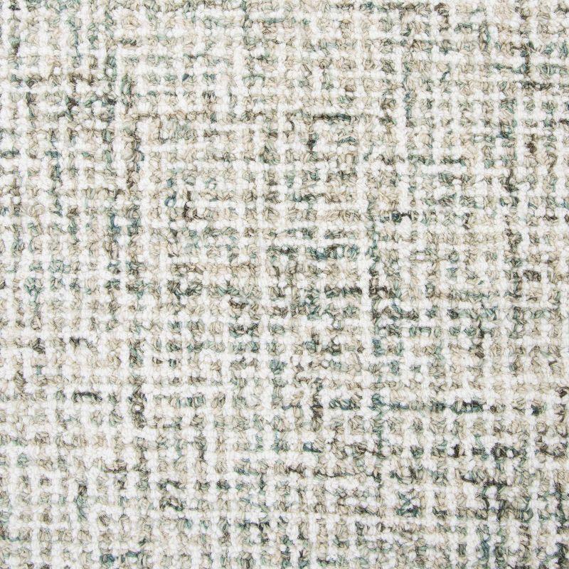 Britley Handmade Tufted Wool Area Rug in Light Green/Ivory