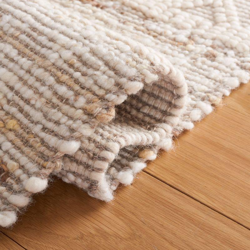 Ivory and Beige Handwoven Wool Area Rug, 4' x 6'