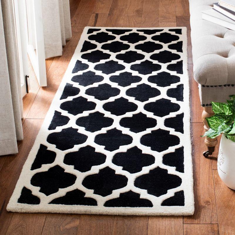 Handmade Dark Blue and Ivory Wool Tufted Area Rug