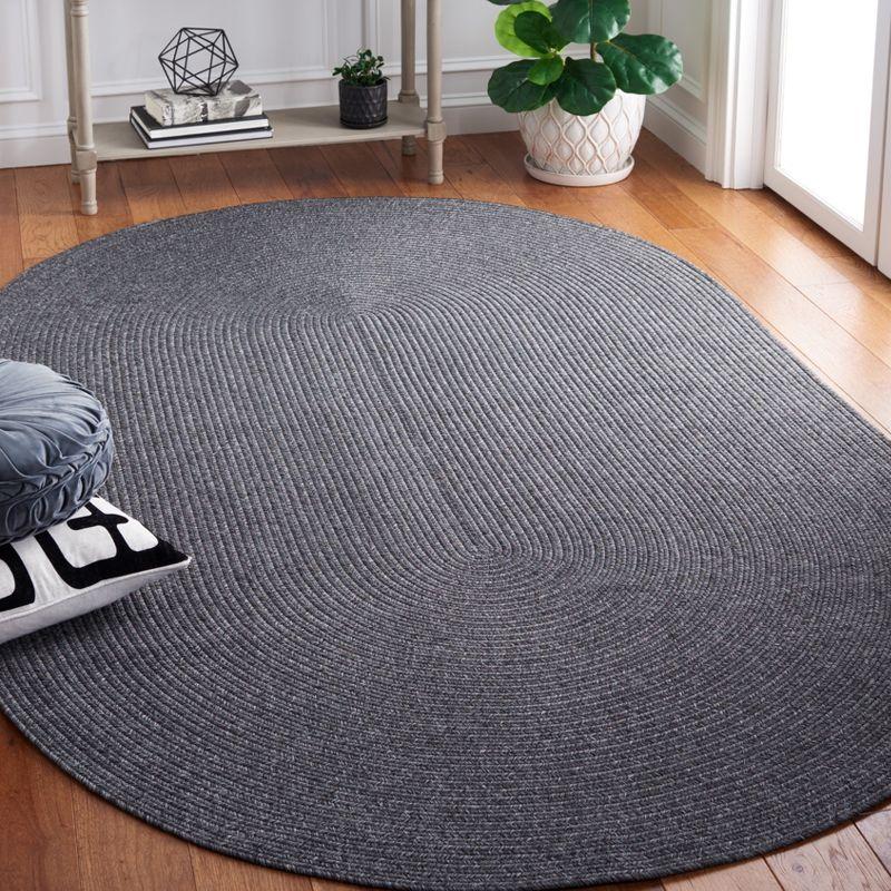 Braided BRA201 Hand Woven Indoor Machine Washable Area Rug - Black - 4'x6' Oval - Safavieh