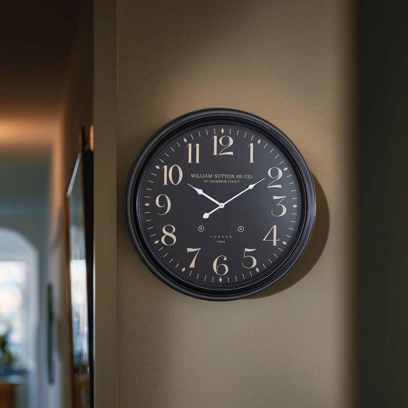 25" Round Iron Wall Clock Black - Yosemite Home Decor: Modern Analog Indoor Timepiece, 1 AA Battery Required