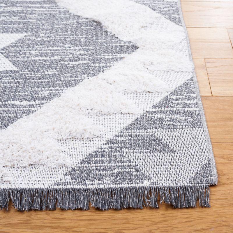 Ivory Nomadic Charm 4' x 6' Synthetic Flat Woven Area Rug