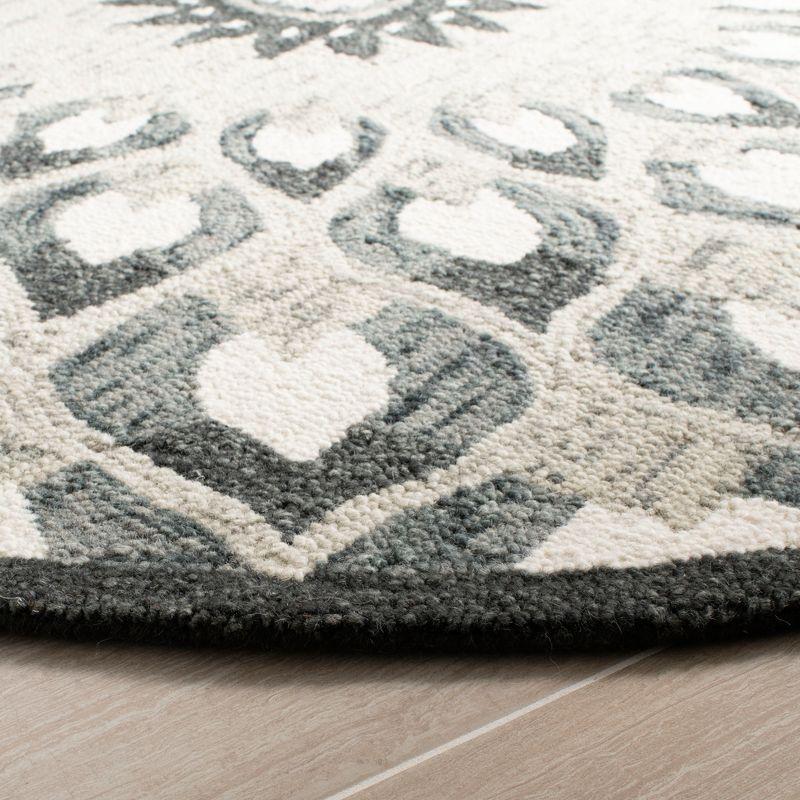 Novelty NOV603 Hand Tufted Area Rug - Charcoal/Ivory - 6' Round - Safavieh.