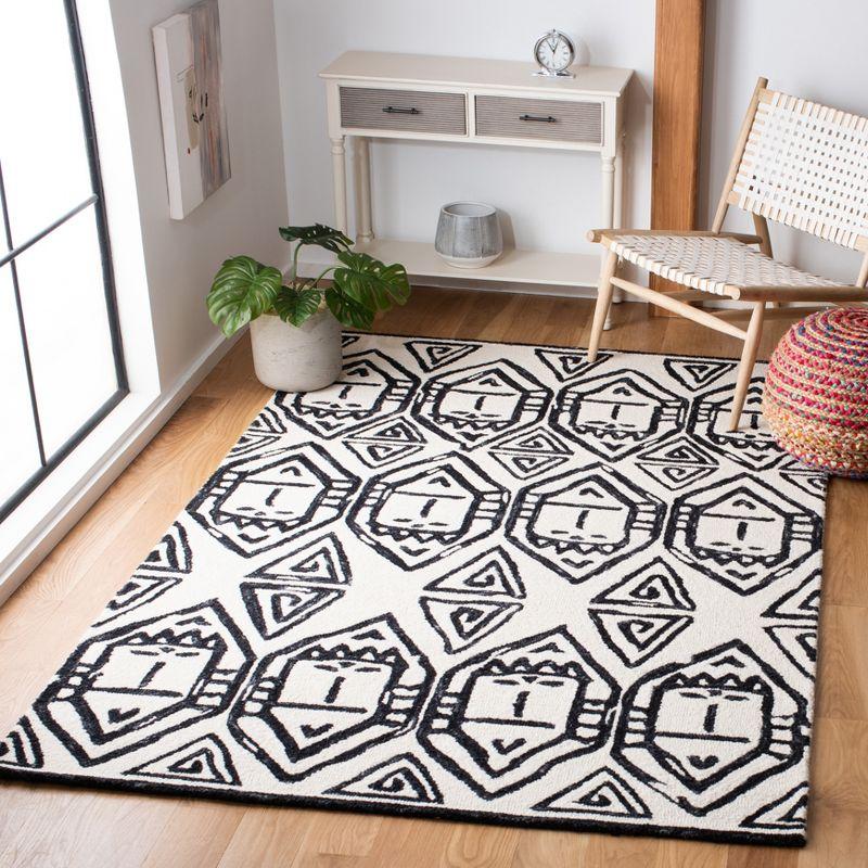 Metro MET404 Hand Tufted Area Rug - Black/Ivory - 3'x5' - Safavieh.